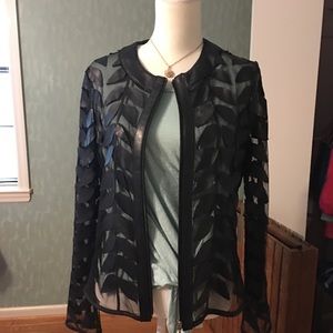 Jacket with leather on sheer fabric
